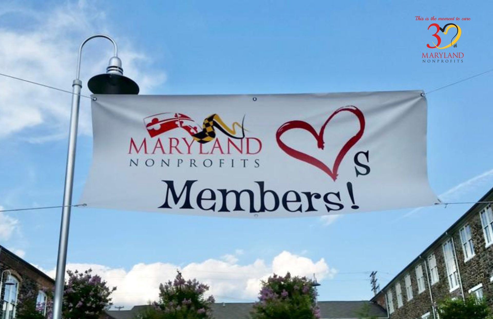 Banner against blue sky: MANO loves our members!
